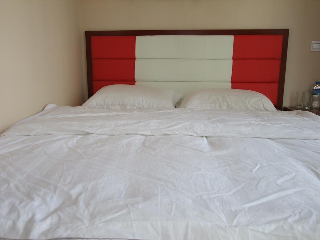 קונמינג Chun Tian Hui Gu Holiday Hotel חדר תמונה