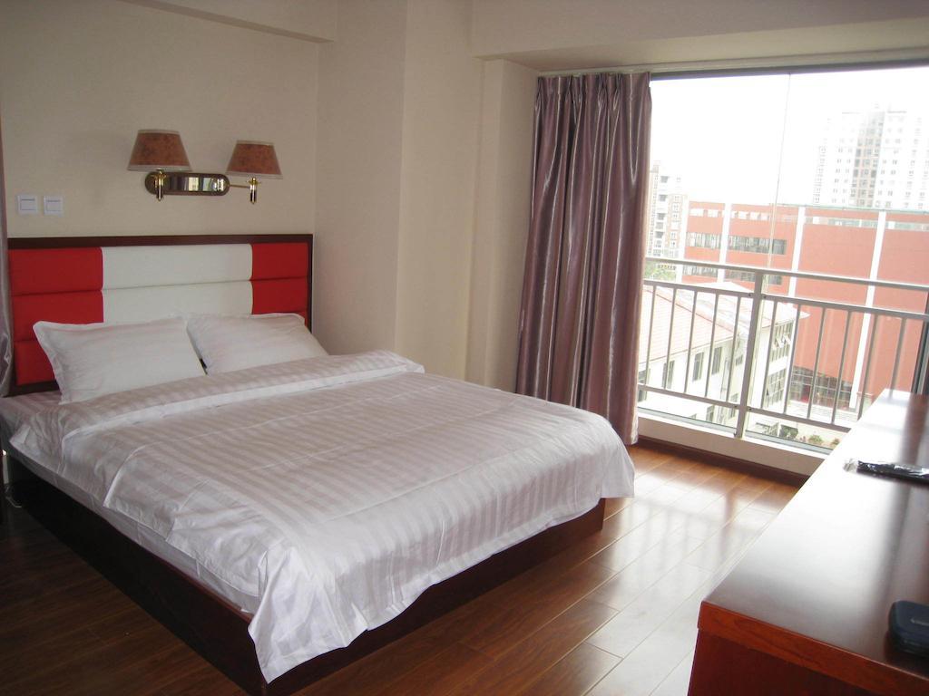 קונמינג Chun Tian Hui Gu Holiday Hotel חדר תמונה