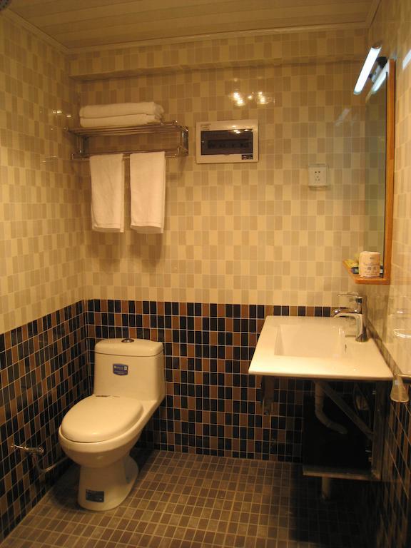 קונמינג Chun Tian Hui Gu Holiday Hotel חדר תמונה