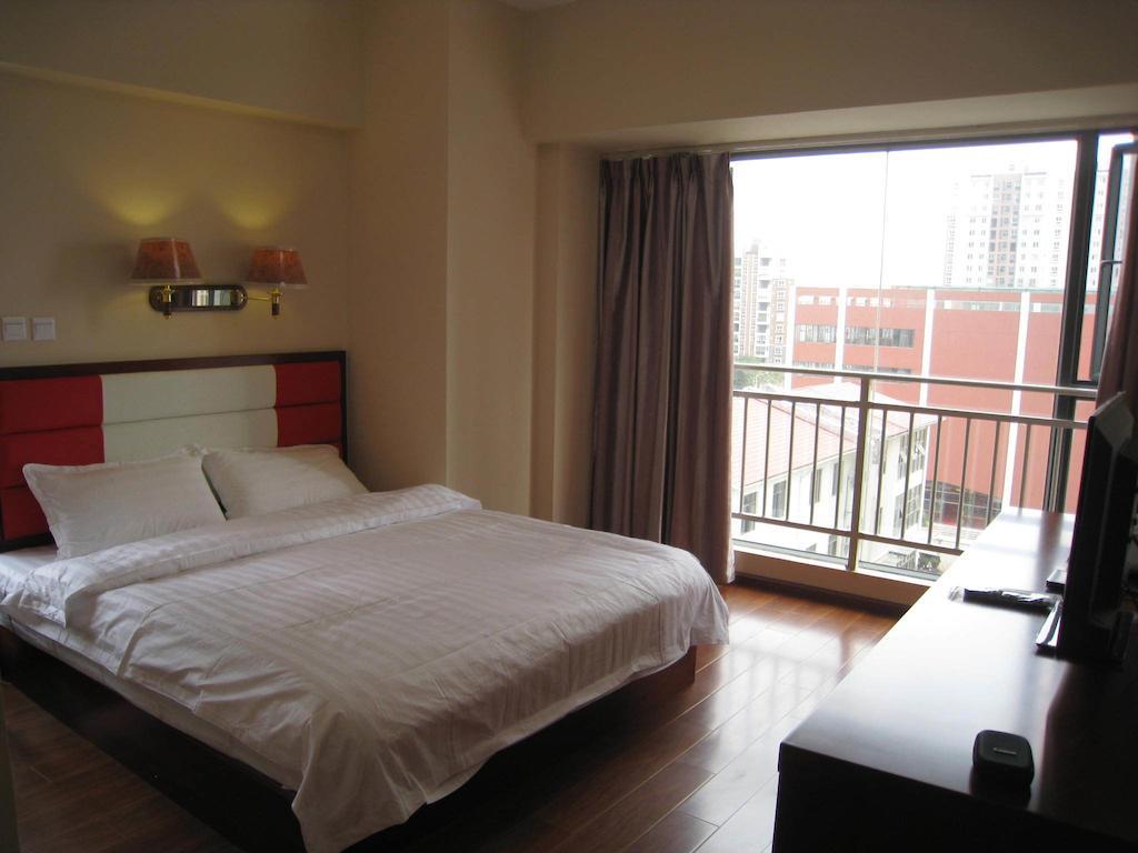 קונמינג Chun Tian Hui Gu Holiday Hotel חדר תמונה